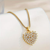 A Stainless Steel chain with plated cubic heart and Rhinestones accents featuring a vintage design. A versatile unisex necklace suitable for men and women alike—ideal as daily wear or party accessories during Christmas Halloween celebrations Unisex