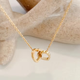 Elegant & Cute Heart to Heart Pendant Necklace for Women Golden Tone Interconnected Hearts Symbolizing Love & Harmony Delicate Chain for Casual Attire Parties & Valentine's Day Gift Year Round Jewelry Heart Necklace Party Accessory Twisted Heart D