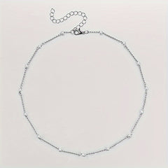 Elegant Necklace With A Touch Of Baroque Style Featuring Faux Pearls And A Creative Minimalist Design.