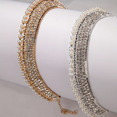 An exaggerated rhinestone and faux necklace suitable for daily wear by women