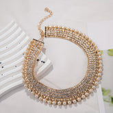 An exaggerated rhinestone and faux necklace suitable for daily wear by women