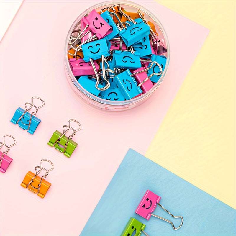 50-pack cartoon face binders (multiple colors available)