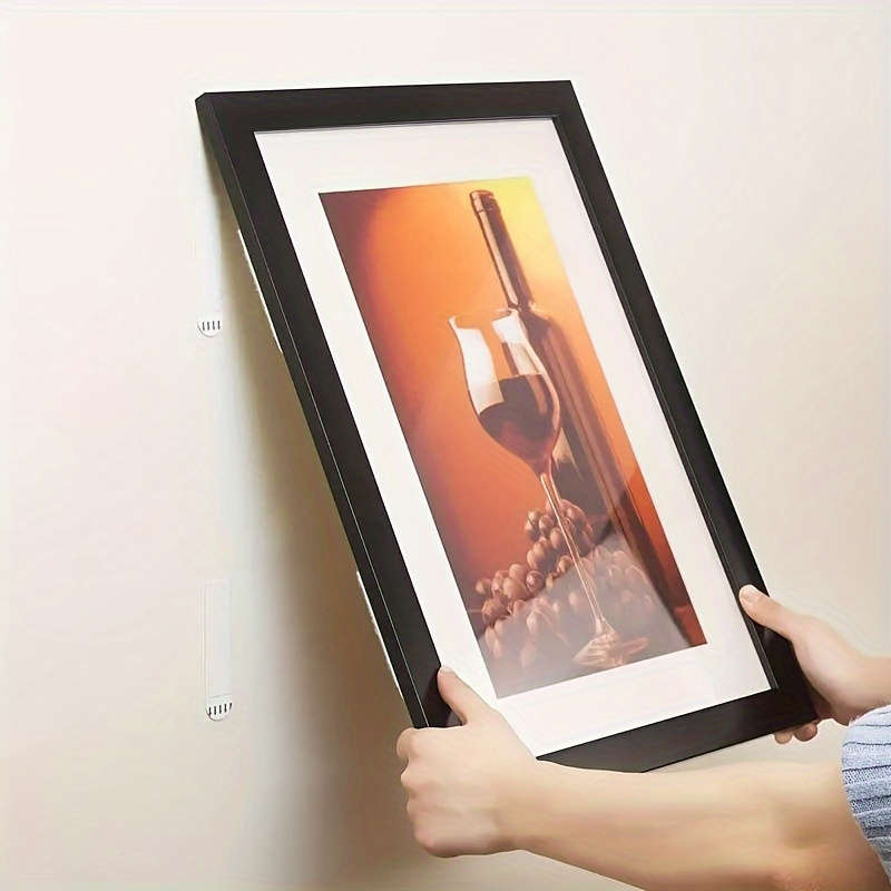 32-pack strong adhesive picture hanging strips with punch holes