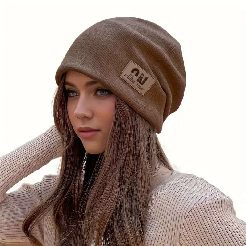 Women's autumn and winter simple trimmed loose knitted hat, solid color warm earmuffs stretch hat