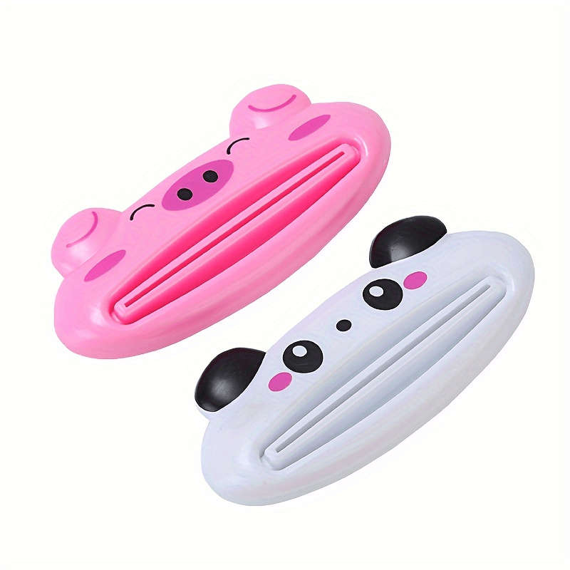 4 cartoon toothpaste squeezers
