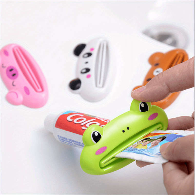 4 cartoon toothpaste squeezers