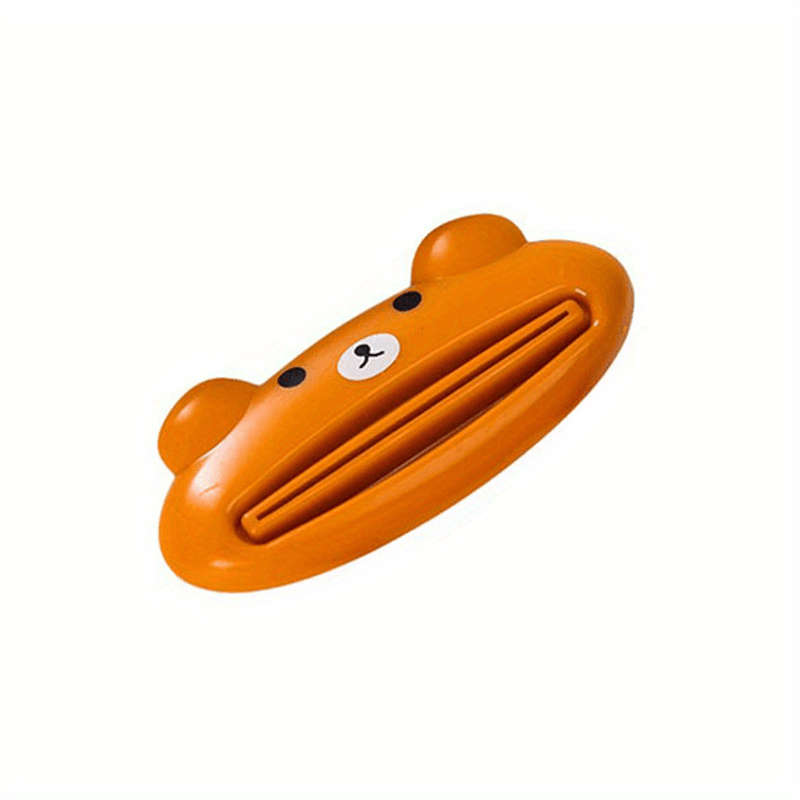 4 cartoon toothpaste squeezers