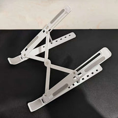 1 piece adjustable laptop stand, 7 angles tilt, portable and foldable ABS plastic, helps improve airflow