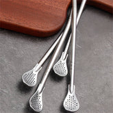 A set of three stainless steel straw spoons