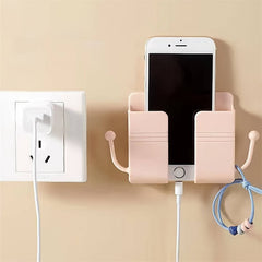 One adhesive wall mount with hooks, perfect for holding phone chargers and remote controls.