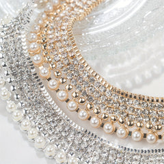 An exaggerated rhinestone and faux necklace suitable for daily wear by women