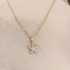 Women's Delicate Golden Tone Starfish Pendant Necklace   Minimalist Beach Jewelry  Everyday & Vacation Necklace for Women  Birthday/Anniversary Gifts for Her   Year Round Coastal Charm Chain  Beach Necklace  Nautical Accessory  Bohemian Jewelry  Fine Jewe