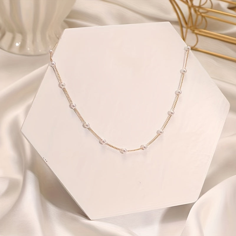 Elegant Necklace With A Touch Of Baroque Style  Featuring Faux Pearls And A Creative Minimalist Design.