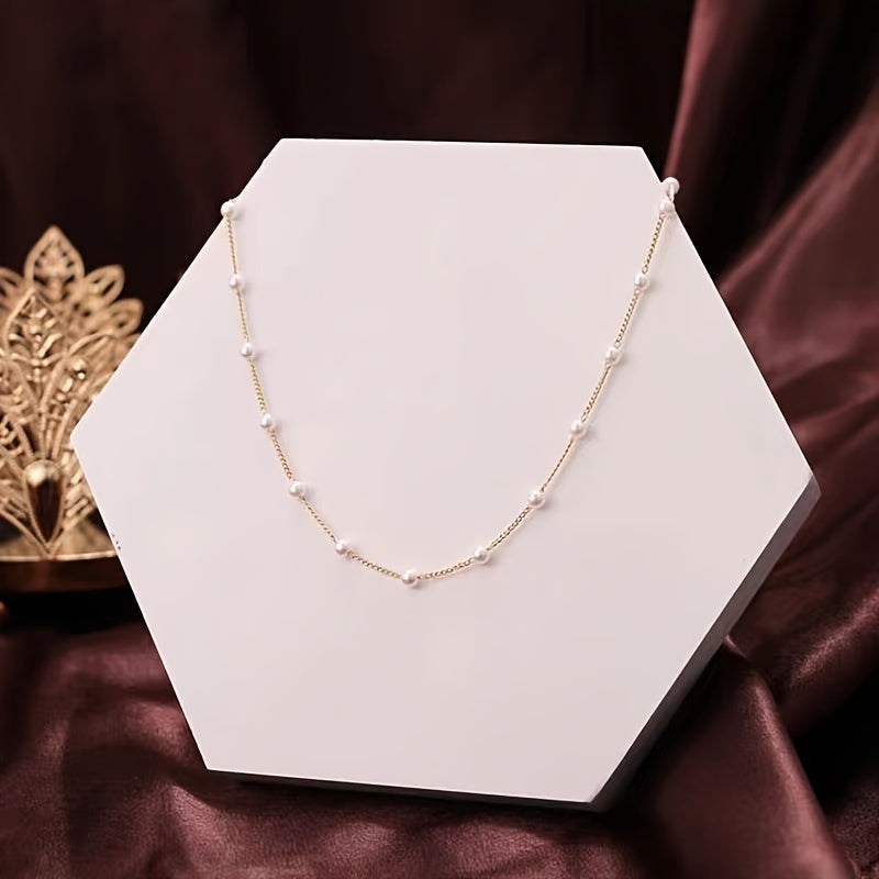 Elegant Necklace With A Touch Of Baroque Style  Featuring Faux Pearls And A Creative Minimalist Design.
