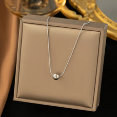 A Fashionable and Minimalist Small Round Bead Pendant  18K Golden Plated  Stainless Steel Women's Choker Necklace  Elegant Choker  Fashion Accessory  Minimalist Pendant  Sleek Design  Highquality Pendant  Lightweight Necklace  Gift For Her