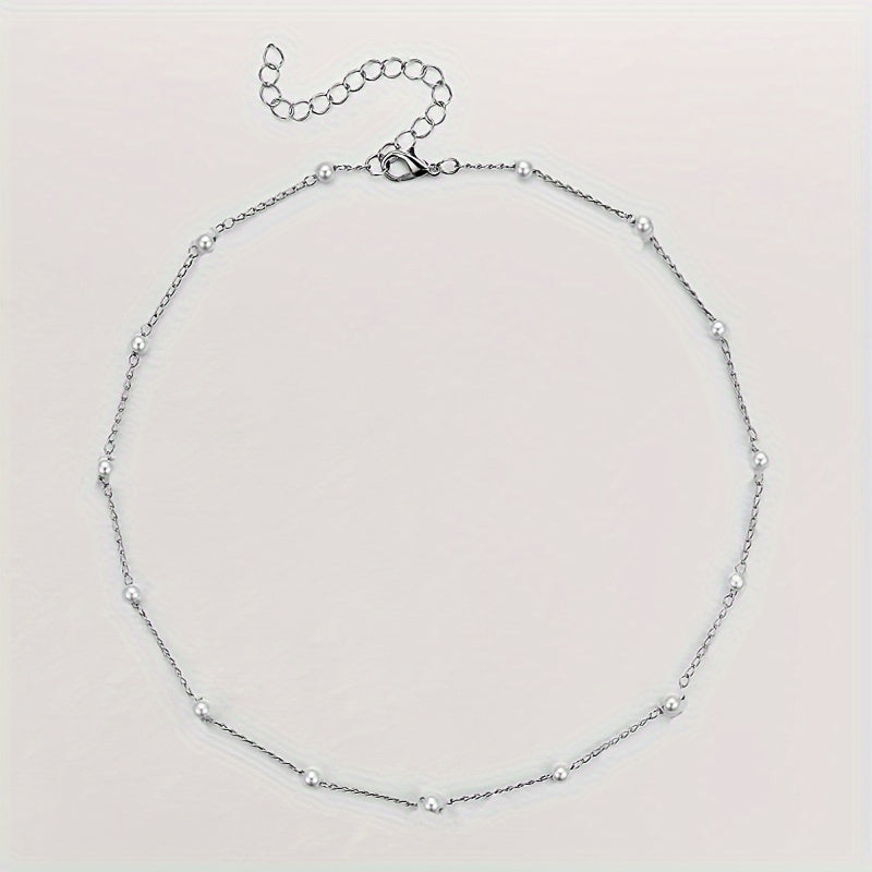 Elegant Necklace With A Touch Of Baroque Style  Featuring Faux Pearls And A Creative Minimalist Design.