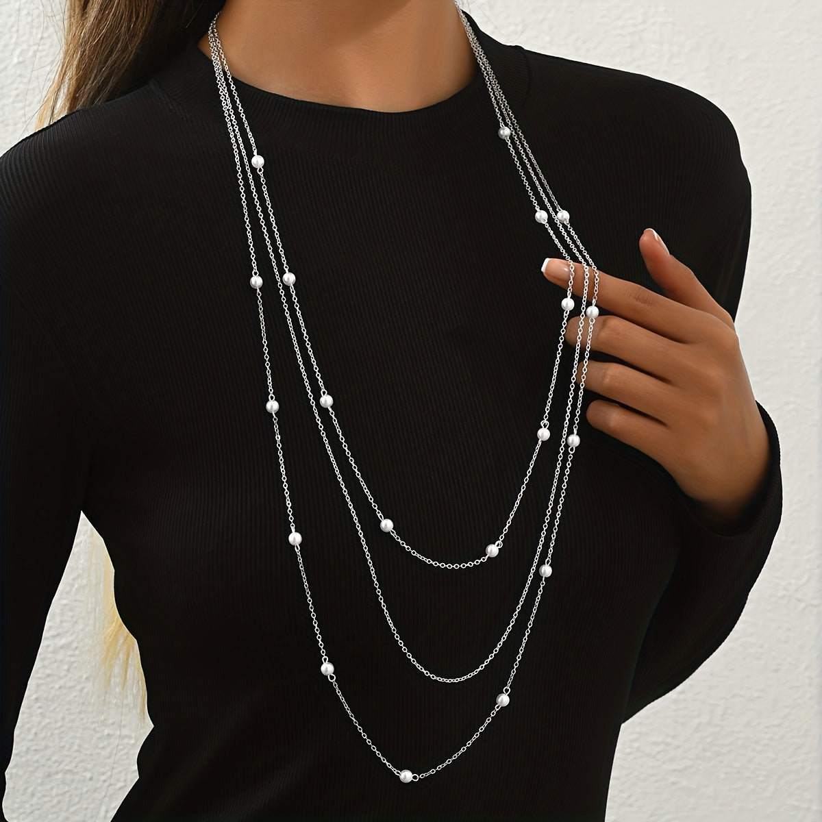 A Stylish And Elegant Three Layer Faux Pearl Long Necklace for Autumn And Winter  Featuring a Geometric Trendy Design  Suitable for Women to Wear on a Daily Basis  for Commuting  Parties  Dates  Music Festivals  And More.