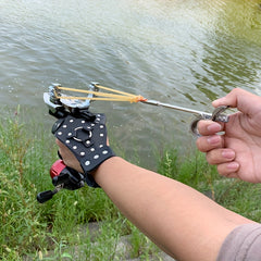 Multi Functional And Durable Outdoor Hunting Slingshot Set with Fishing Accessories Adult Slingshot Fits Snugly On The Hand And Has Good Grip Stability Comes with Fishing Wheel And Rolling Wheel Multi Functional Slingshot Hunting