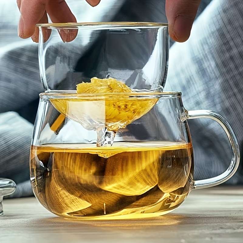1 glass teacup with tea infuser and lid