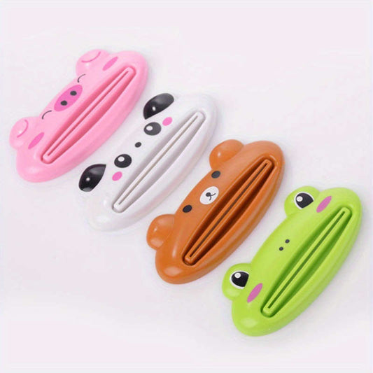 4 cartoon toothpaste squeezers