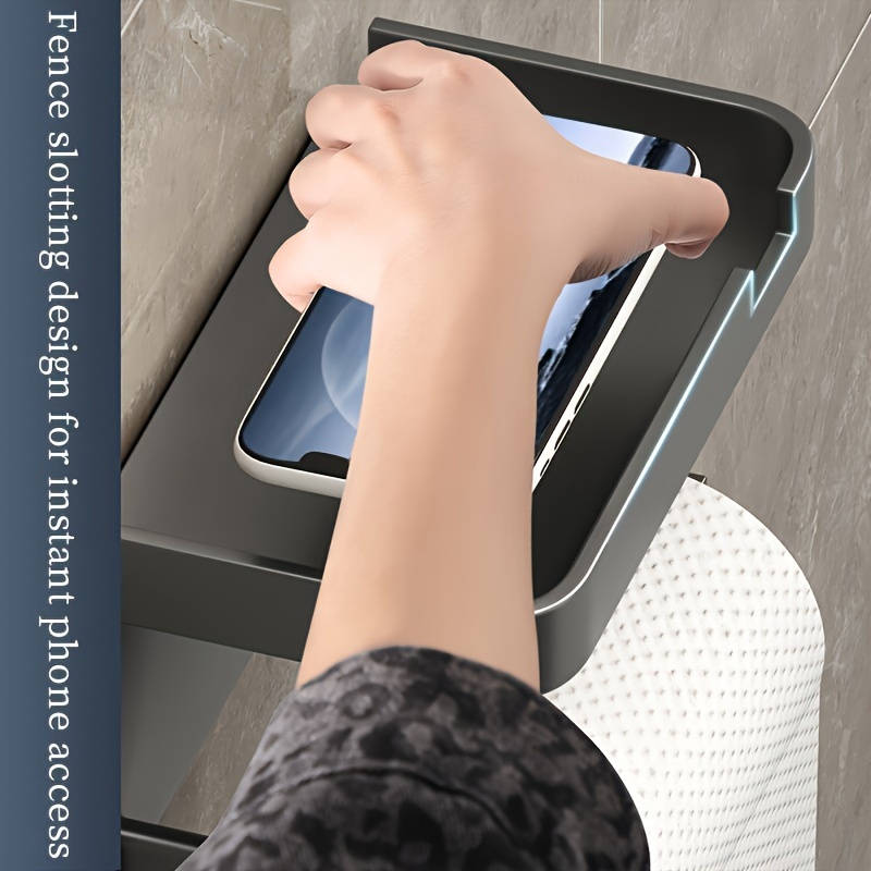 Space saving self-adhesive toilet paper holder with storage shelf