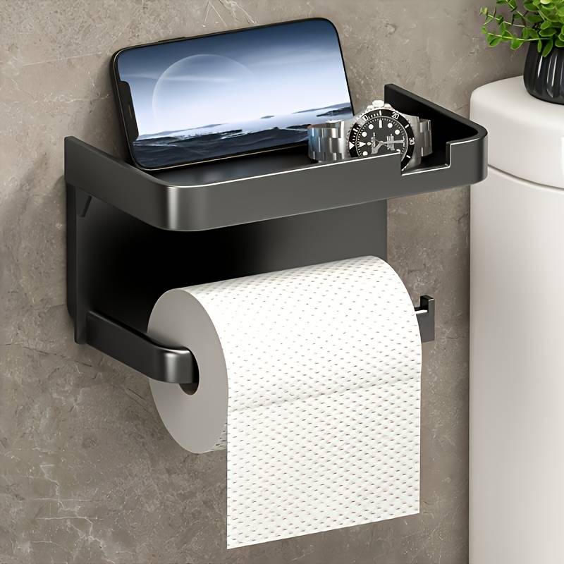 Space saving self-adhesive toilet paper holder with storage shelf