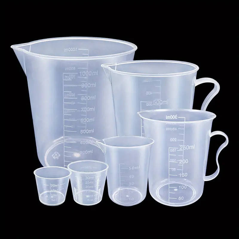 Set of 6 clear plastic measuring cups with easy-pour spouts, durable and precise for baking and cooking