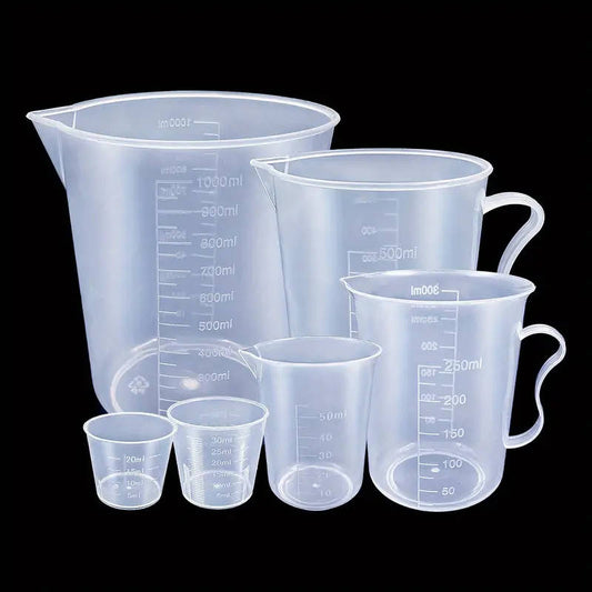 Set of 6 clear plastic measuring cups with easy-pour spouts, durable and precise for baking and cooking
