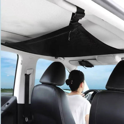 One large-capacity roof storage net with expandable mesh storage pockets.