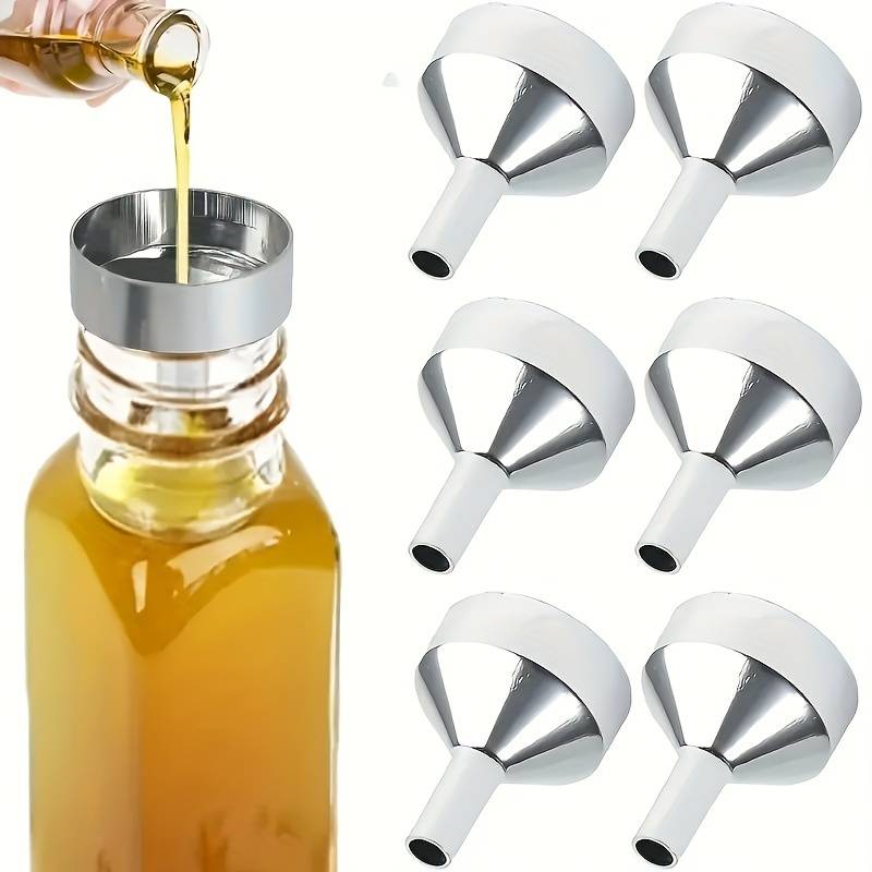 A set of small gold funnels designed specifically for perfumes and essential oils, making it easy to transfer and pour various liquids.