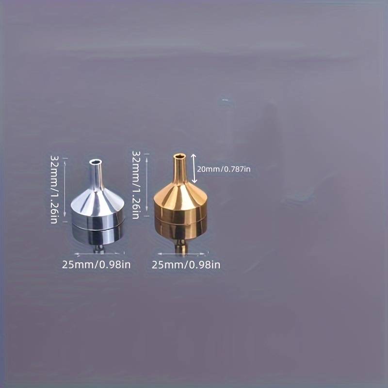 A set of small gold funnels designed specifically for perfumes and essential oils, making it easy to transfer and pour various liquids.