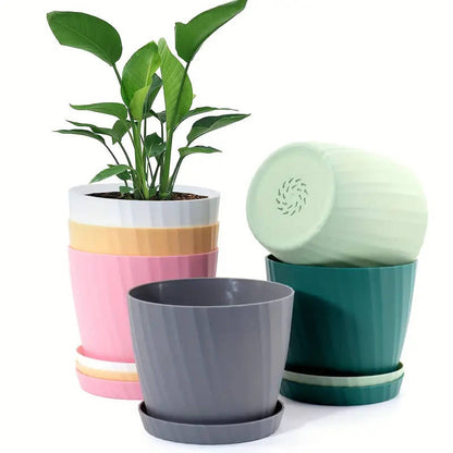 6 six-inch garden pots, grey pitted
