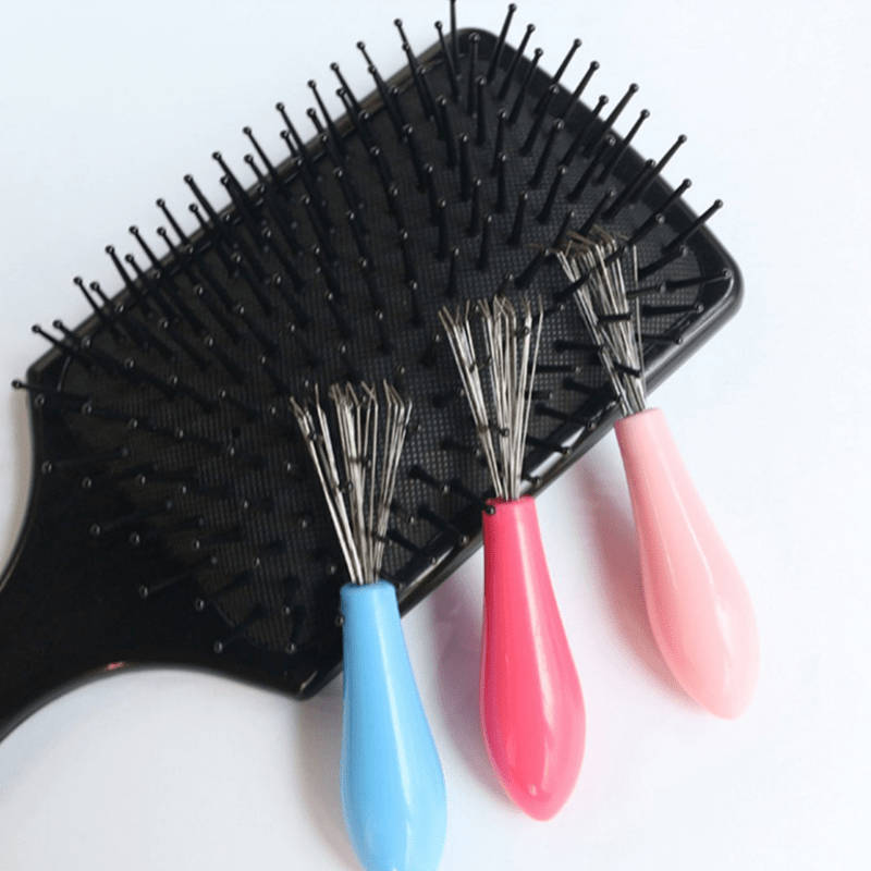 Comb cleaning brush