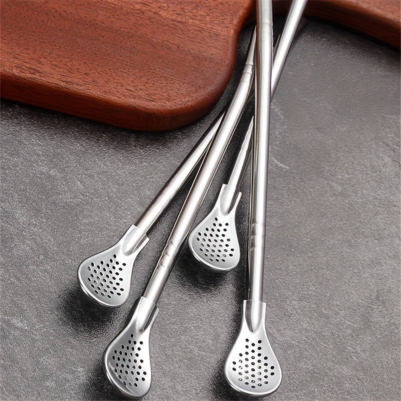 A set of three stainless steel straw spoons