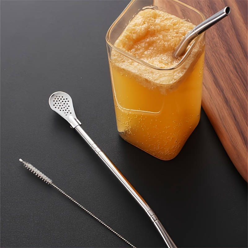 A set of three stainless steel straw spoons