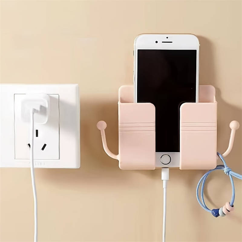 One adhesive wall mount with hooks, perfect for holding phone chargers and remote controls.