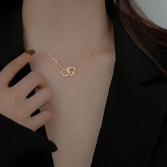 Elegant & Cute Heart to Heart Pendant Necklace for Women   Golden Tone Interconnected Hearts Symbolizing Love & Harmony  Delicate Chain for Casual Attire  Parties & Valentine's Day Gift  Year Round Jewelry  Heart Necklace  Party Accessory  Twisted Heart D