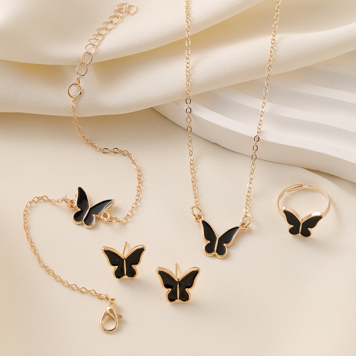 Women's Elegant Butterfly Pendant Necklace & Layered Chain Set   Golden Toned Black Butterfly Design  Minimalist Bohemian Style Interlocking Link Necklace with Delicate Butterfly Charm  Versatile Everyday & Formal Jewelry for Women  Year Round Layered Nec