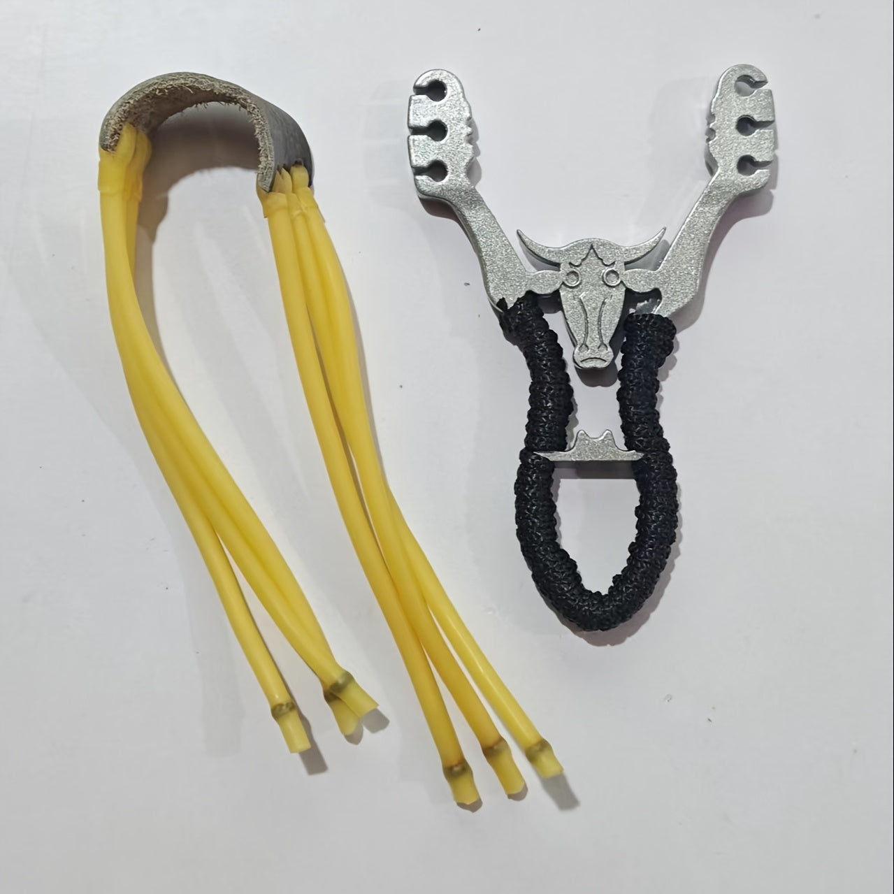 High power aluminum alloy slingshot with rubber band  suitable for hunting and fishing  black and yellow design  durable outdoor throwing tool  precise shooting and fishing