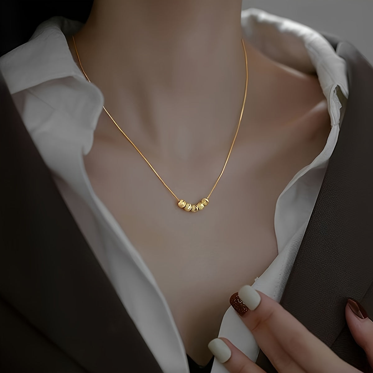 A Lesser than luxury  18 carat Bead plated  Stainless Steel Necklace Is Suitable For Women To Wear In Their Daily Lives Or As Gifts